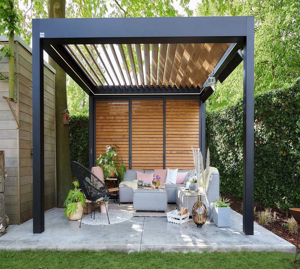 Modern louvered pergola with cozy outdoor seating and wood privacy panels Modern louvered pergola with cozy outdoor seating and wood privacy panels