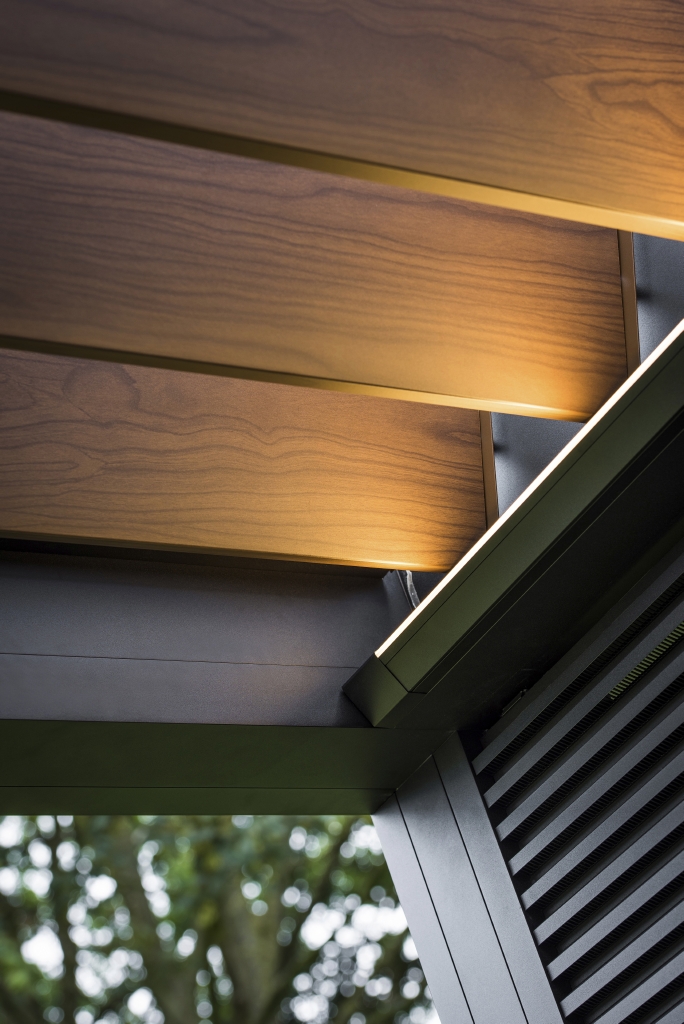 close up of wooden aluminum louvres in a pergola system