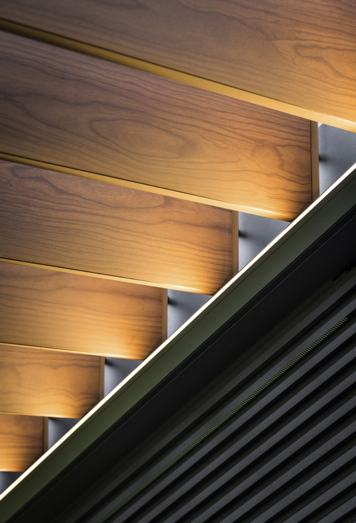 close up of brown wooden aluminum style louvres in a roof system