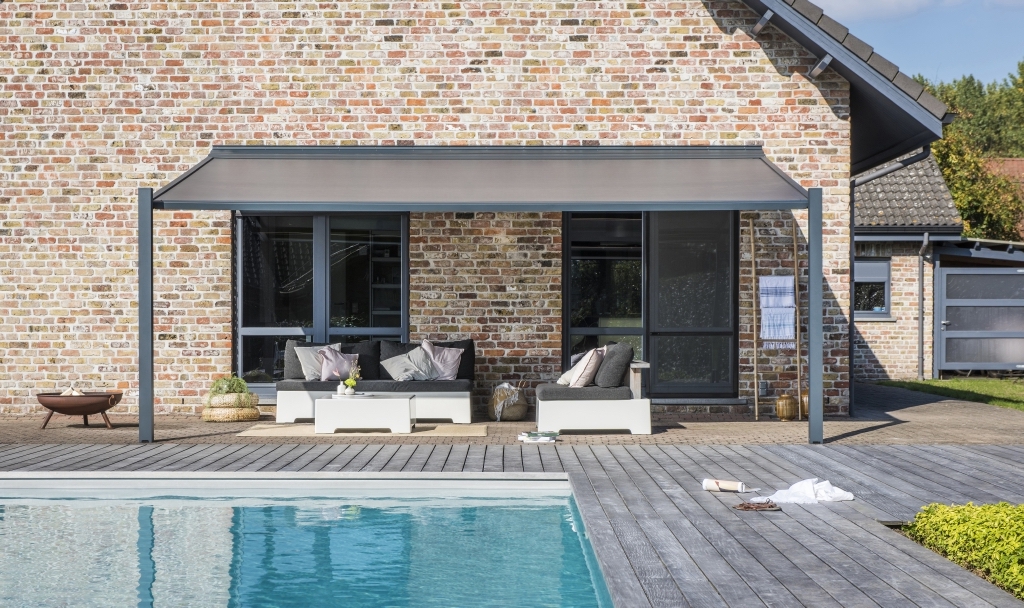 Poolside PVC retractable pergola attached to home Poolside PVC retractable pergola attached to home