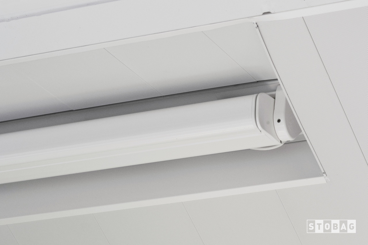 Close up view of sleek box that houses the arm bracket awning when fully closed
