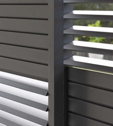 Close up view of Loggia panels in slate gray metal with slats that tilt and close for privacy