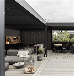 black aluminum cladding installed on a wall of a residential outdoor patio alcove