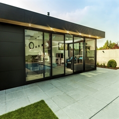 horizontal aluminum cladding in black installed on the exterior of a residential home for design