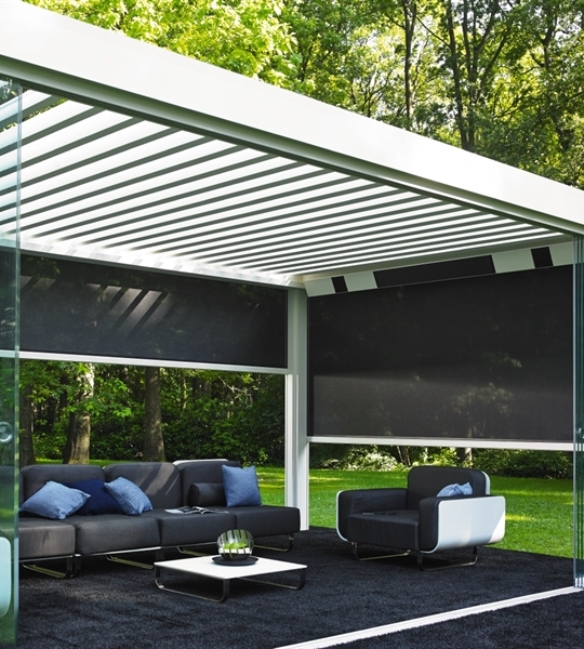 Patio heaters integrated into side pergola roof beam over an outdoor living area