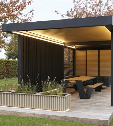 Roof beams of retractable pergola have incorporated soft led lights that shine up and down