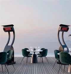 2 portable outdoor heaters distanced apart from each other on an outdoor patio turned on