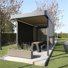 Linarte aluminum cladding wall incorporated as side enclosure of an aluminum pergola on patio