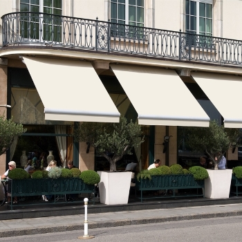 Cream awnings covering an outdoor restaurant patio