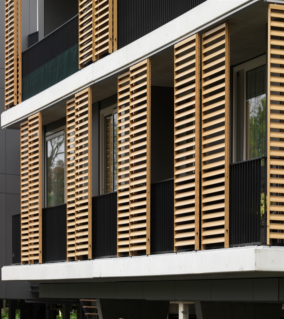 Yellow Renson Loggia panels with a block style louvre