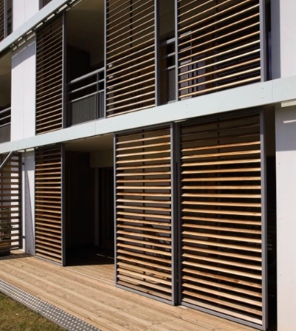 Loggiawood sliding shutter panels made with wooden louvres
