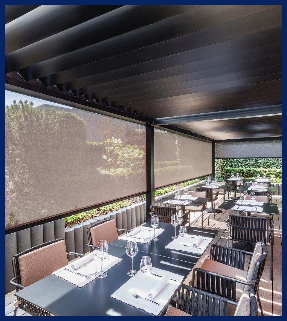 black fabric screens that are see-through enclosing a restaurant patio black fabric screens that are see-through enclosing a restaurant patio