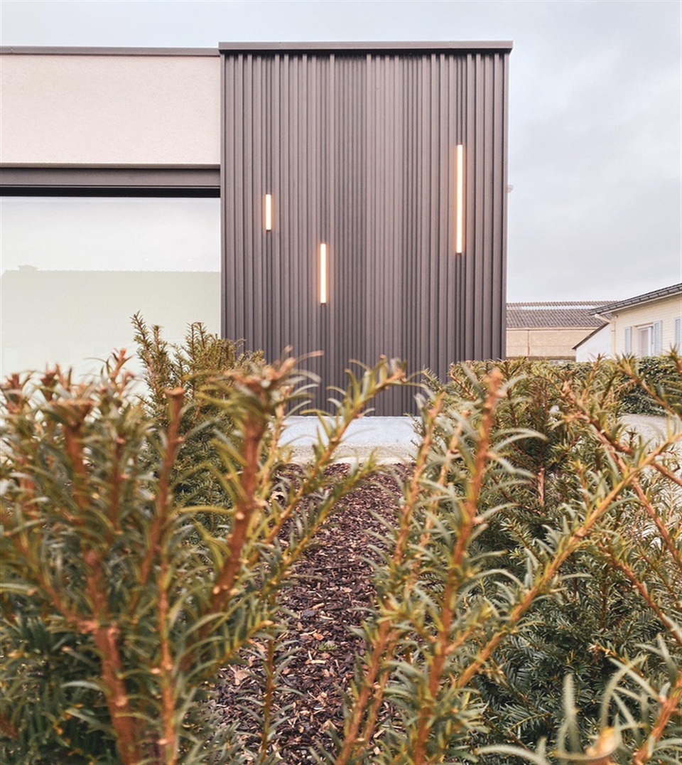 black strip facade cladding covering the exterior of a home