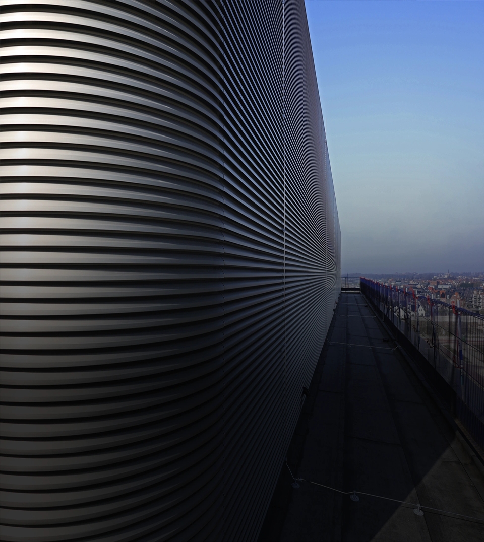 Minimalist horizontal facade on a roof of a high-rise building.