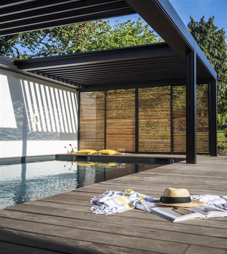 Renson Camargue Skye retractable pergola covering a pool