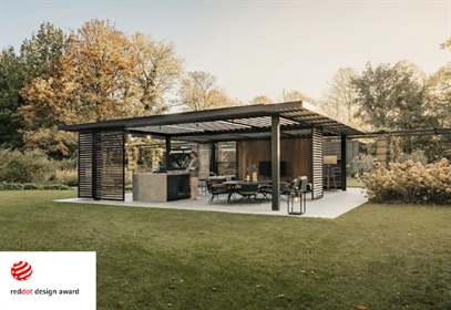 Modern pergola with slatted panels and outdoor kitchen, Red Dot Design
