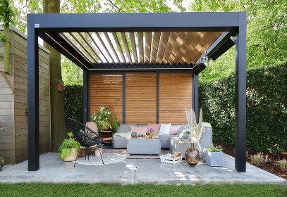 Modern louvered pergola with cozy outdoor seating and wood privacy panels  