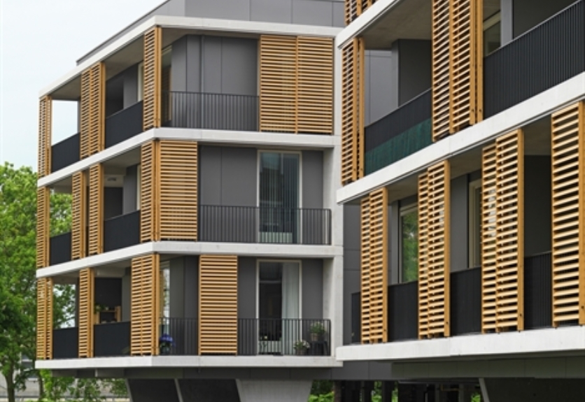 Bergschenhoek Apartments showing sliding shutters and panels by Renson