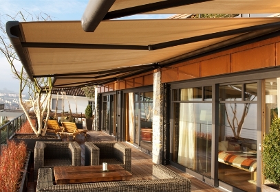 Retractable Canvas Awning attached to a wall