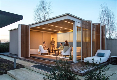 Modern outdoor pavilion with wood screens and LED lighting