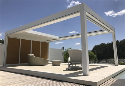white louvred retractable canopy in summer on porch with wooden side panels