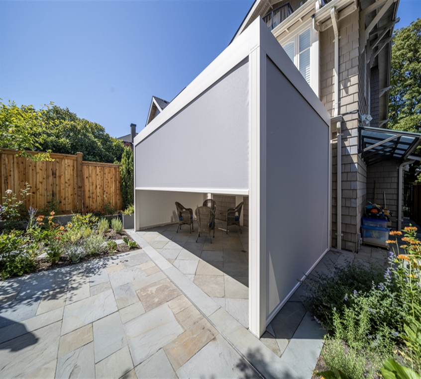 Skye pergola screens half raised to garden