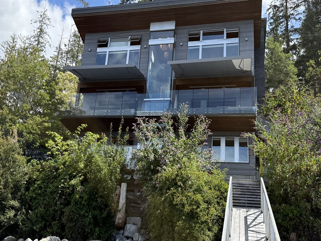 Pratic T-Hide awnings over a patio, BC coast
