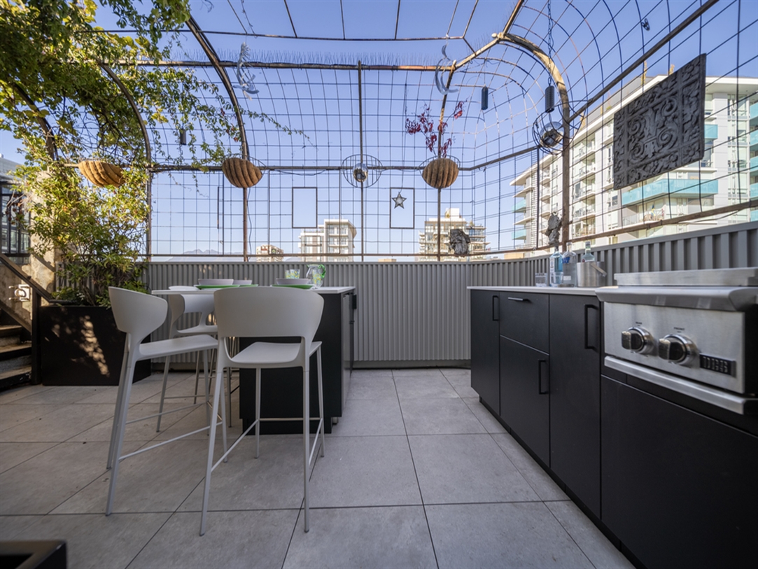 A private patio with a unique backwall design