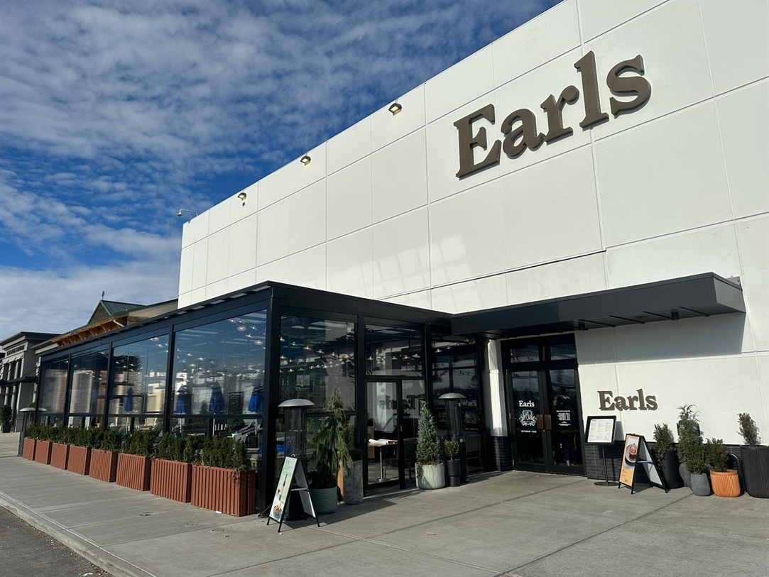 Covered Earls restaurant patio enclosed 