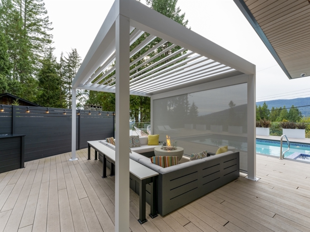 white louvred pergola with louvres open white louvred pergola with louvres open