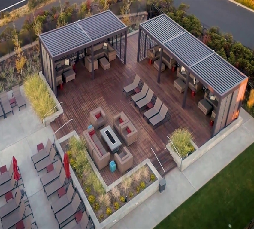 Two pergolas from an aerial view with a fire pit Two pergolas from an aerial view with a fire pit