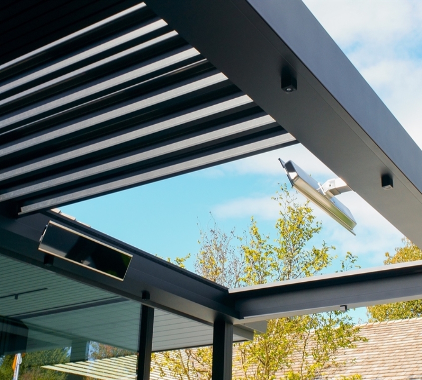 black retractable pergola with louvres open black retractable pergola with louvres open