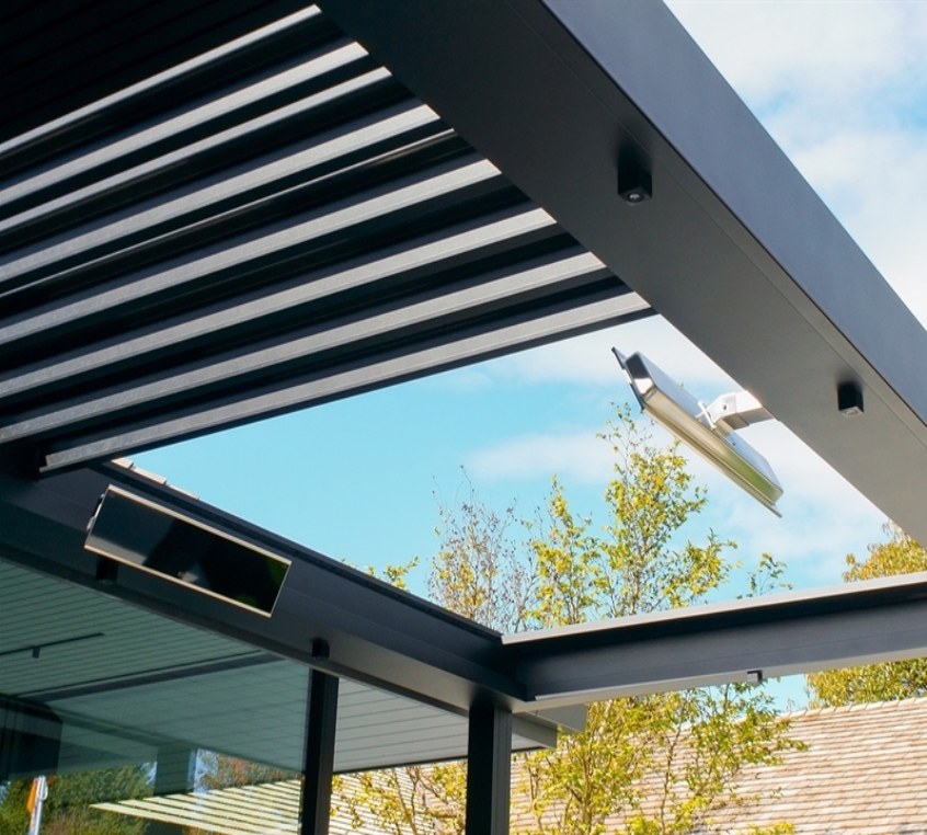 black retractable pergola with louvres open 