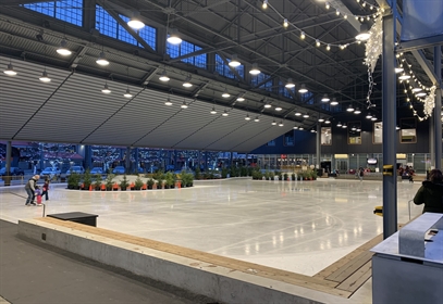 Lights illuminate a skating rink 