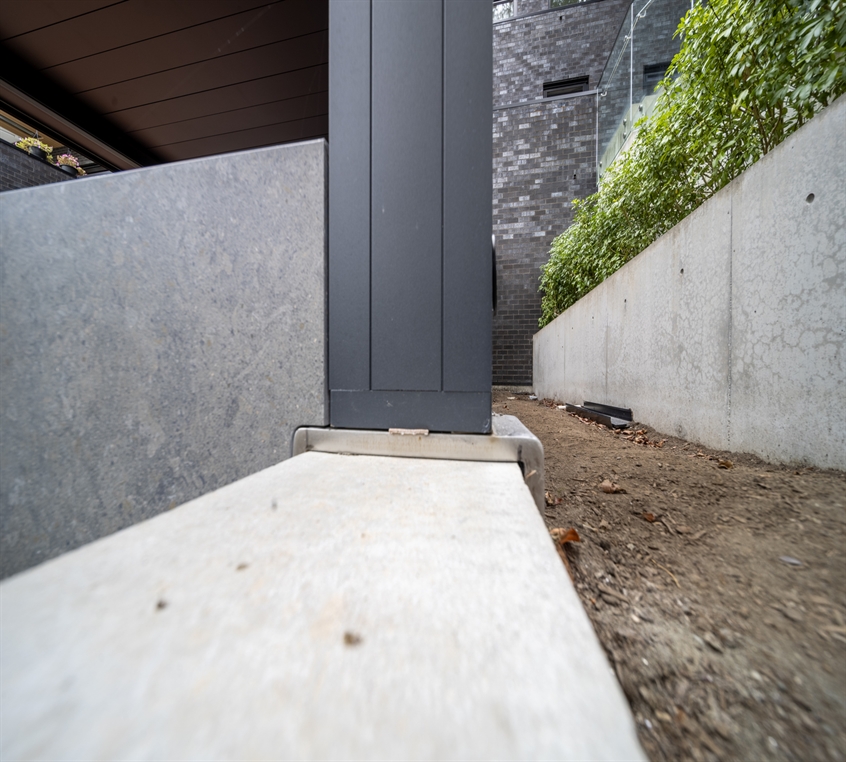 Motorized pergola over a rear terrace, close up