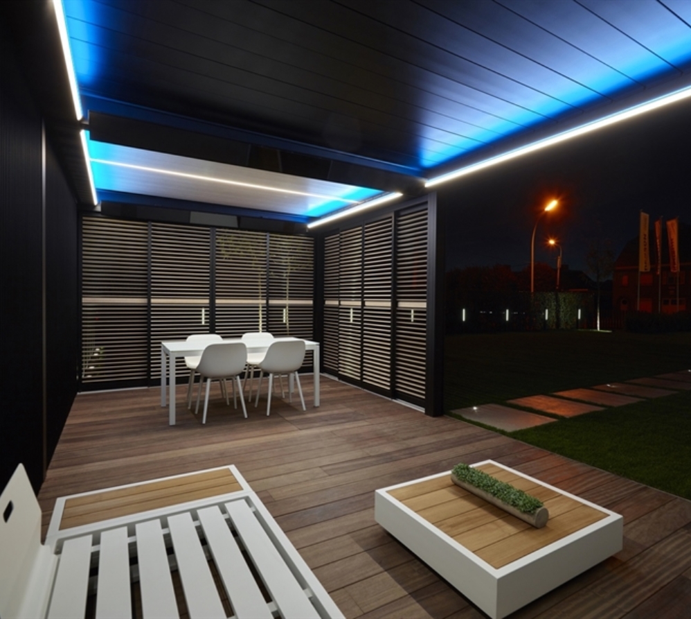 white led lighting strips integrated in the louvres of a louvred roof system in white