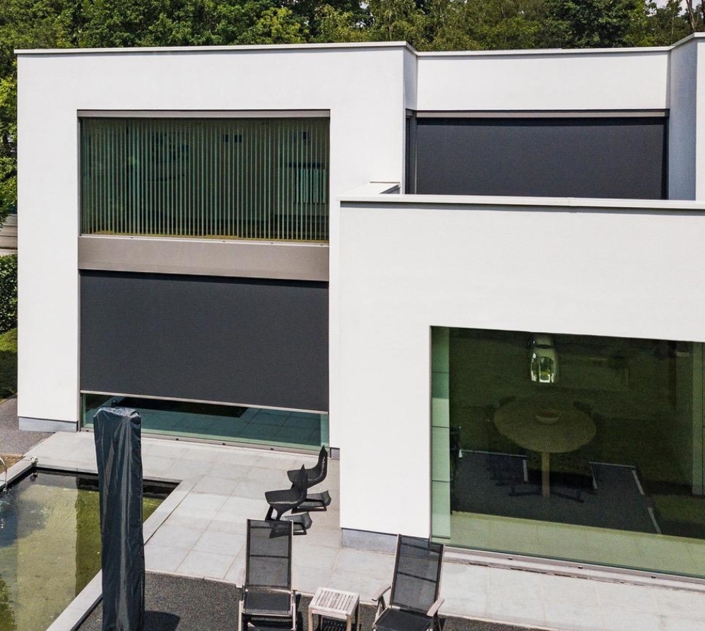 minimalistic screens in the daytime installed on the exterior of a window of a home minimalistic screens in the daytime installed on the exterior of a window of a home